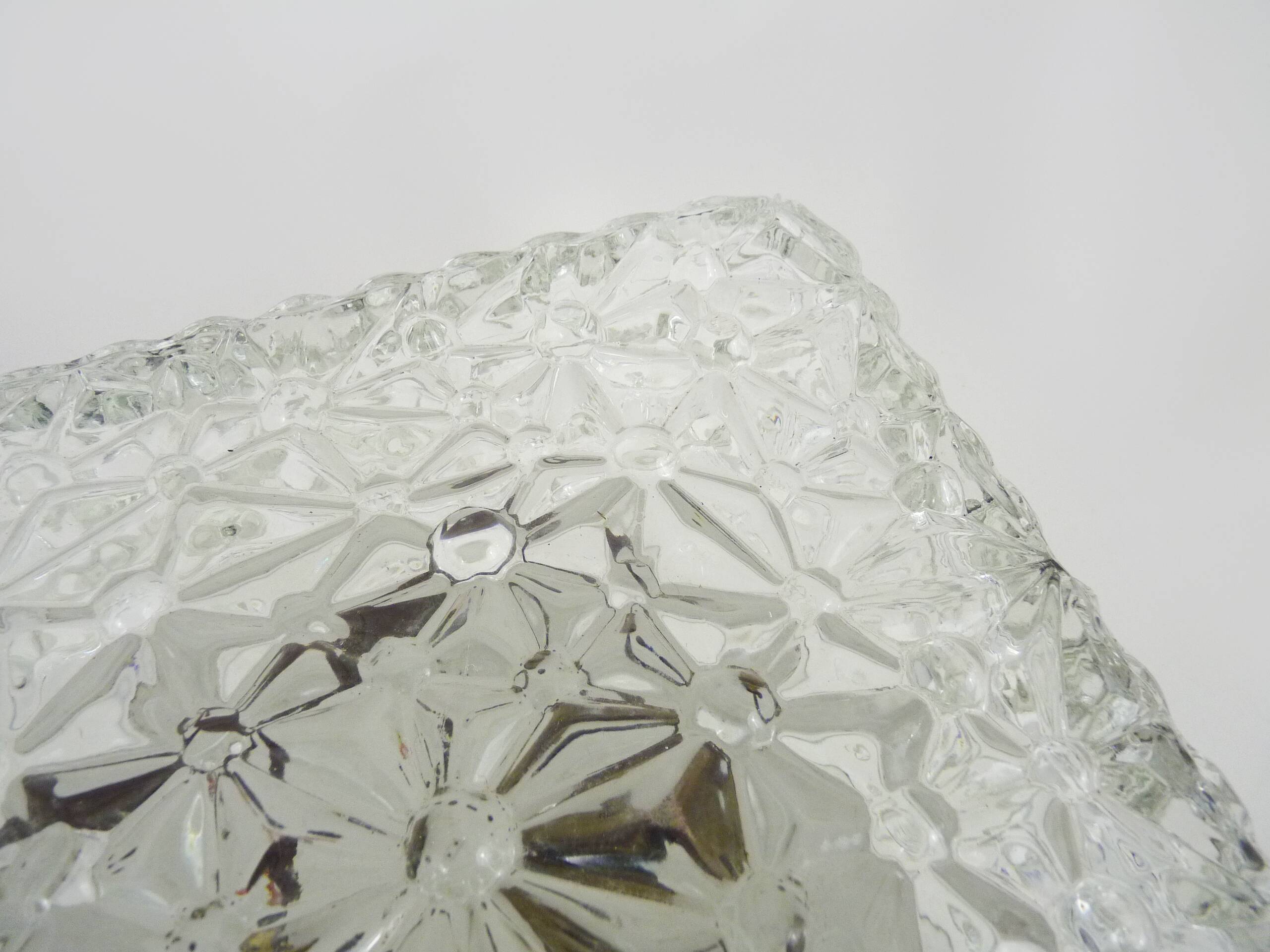 Wall lamp or ceiling light in glass and metal from the 50s and 60s.