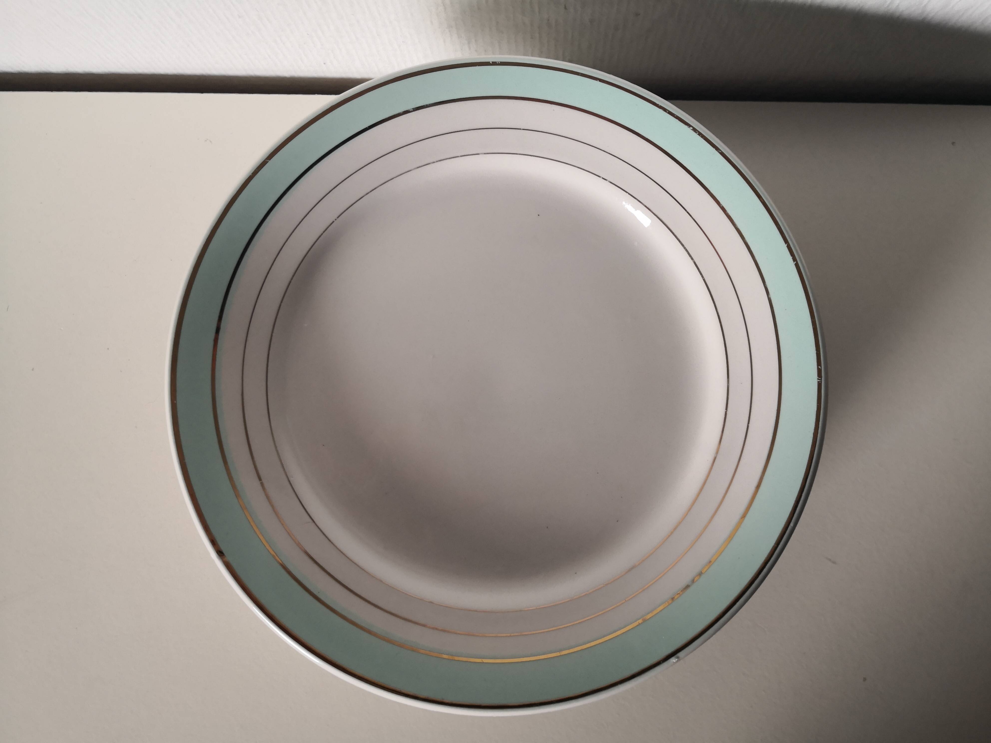 set of 9 green, white and gold Luneville plates