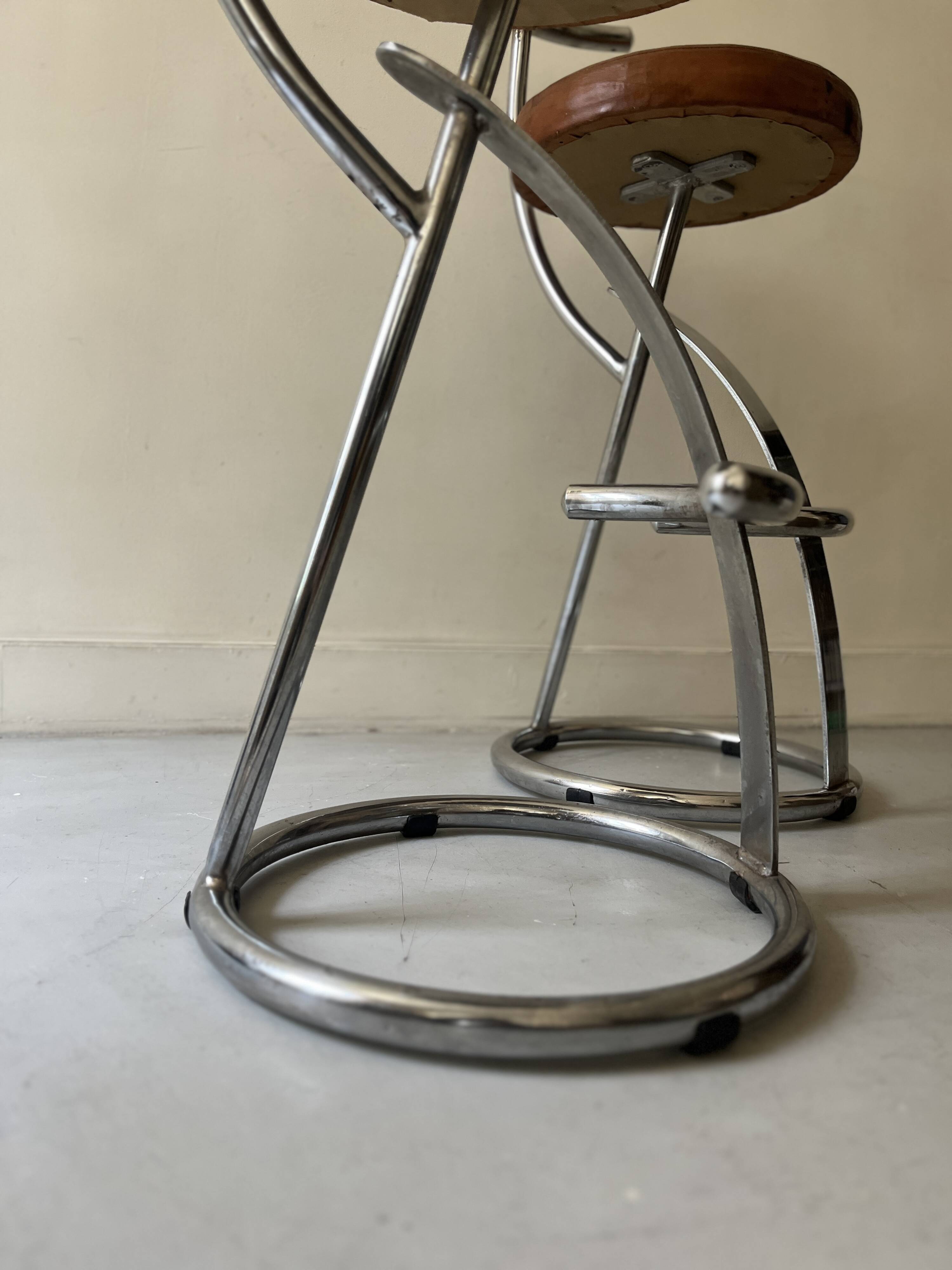 Bar stools in tubular chrome and tan leather, 1970s
