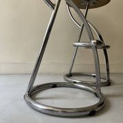 Bar stools in tubular chrome and tan leather, 1970s