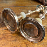 Pair of brass and stone candlesticks