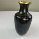 Vase en laiton émaillé noir et doré
