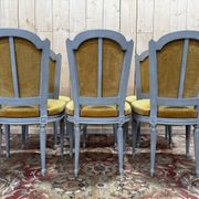 Set of 6 Louis XVI style chairs with polished wood and velvet.