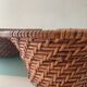 Trio of vintage woven rattan and wicker baskets