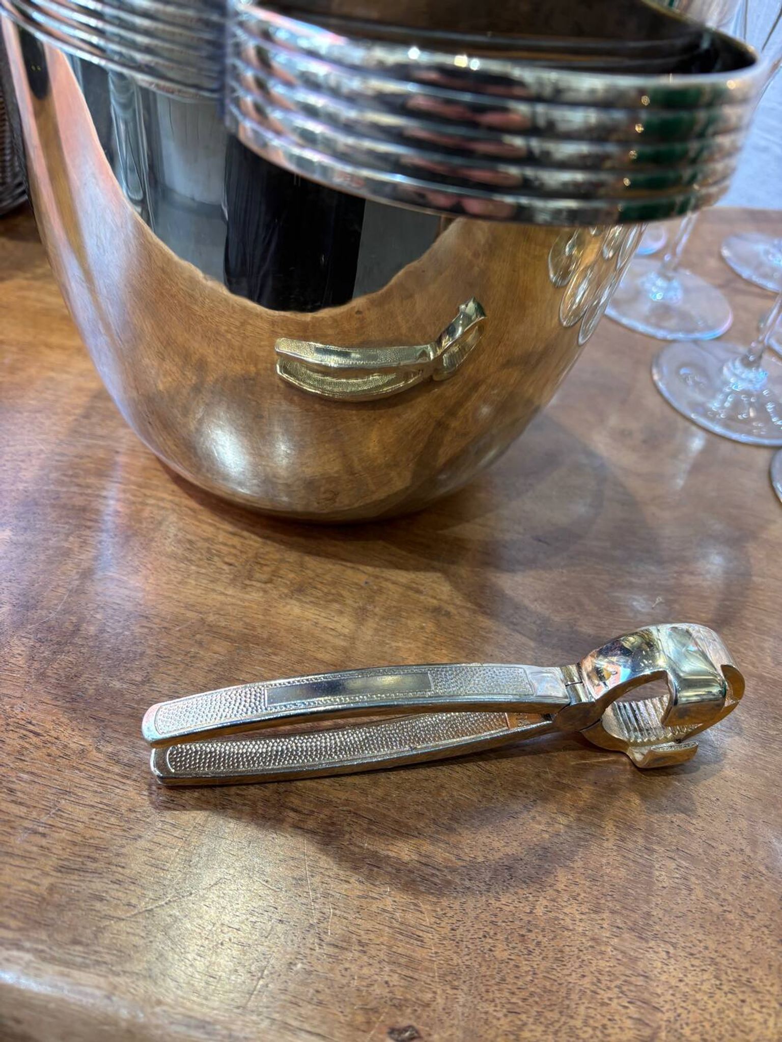 Alpaca champagne bucket from the 1920s with its monopole tongs.