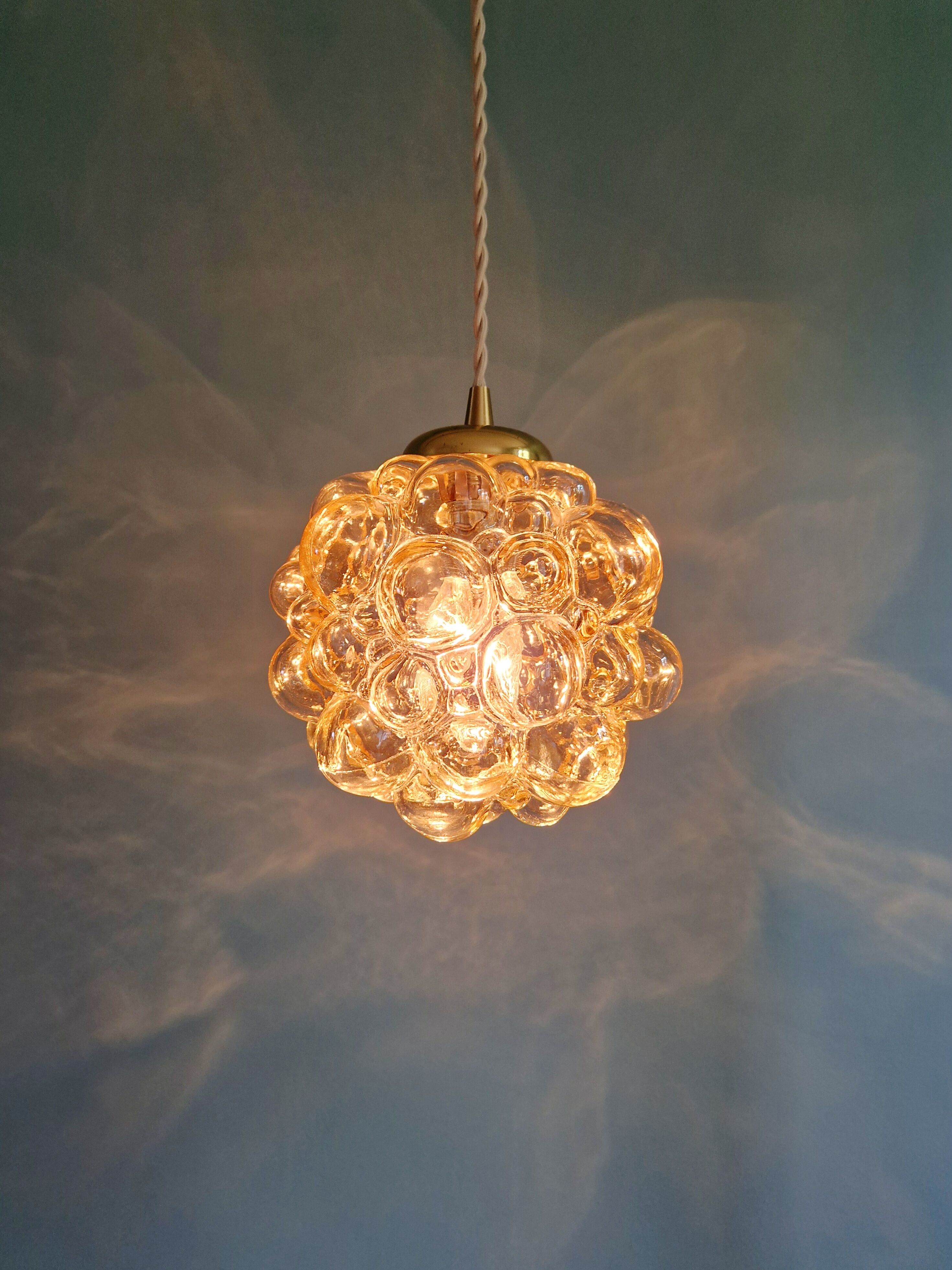 Amber bubble glass pendant (3 available), design by Helena Tynell, 1970.