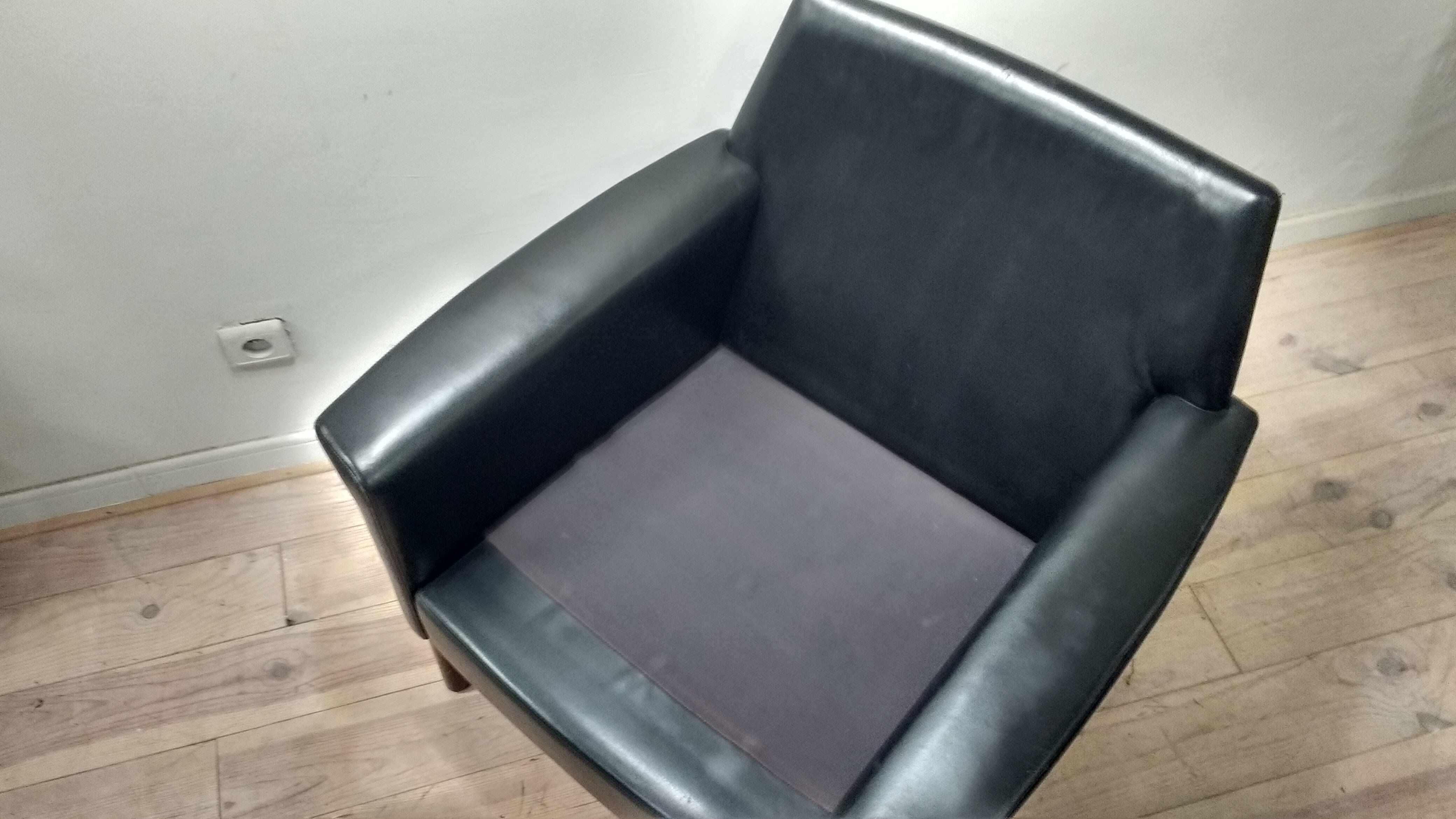 Pair of leather Danish chairs