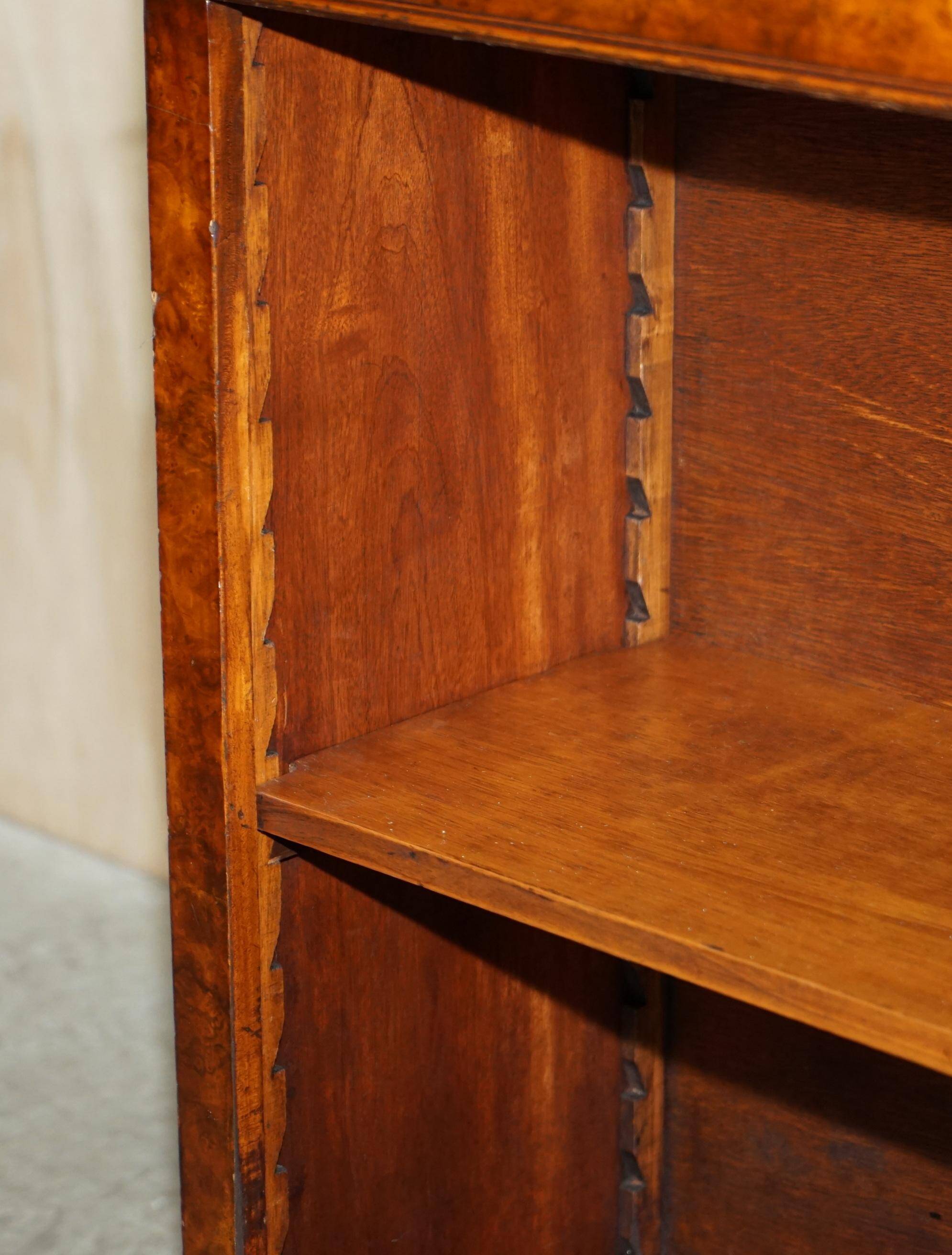 Brights of Nettlebed style Sheraton dwarf library in burr elm, walnut, and mahogany.