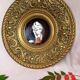 Brass wall decoration repelled hand-painted portrait