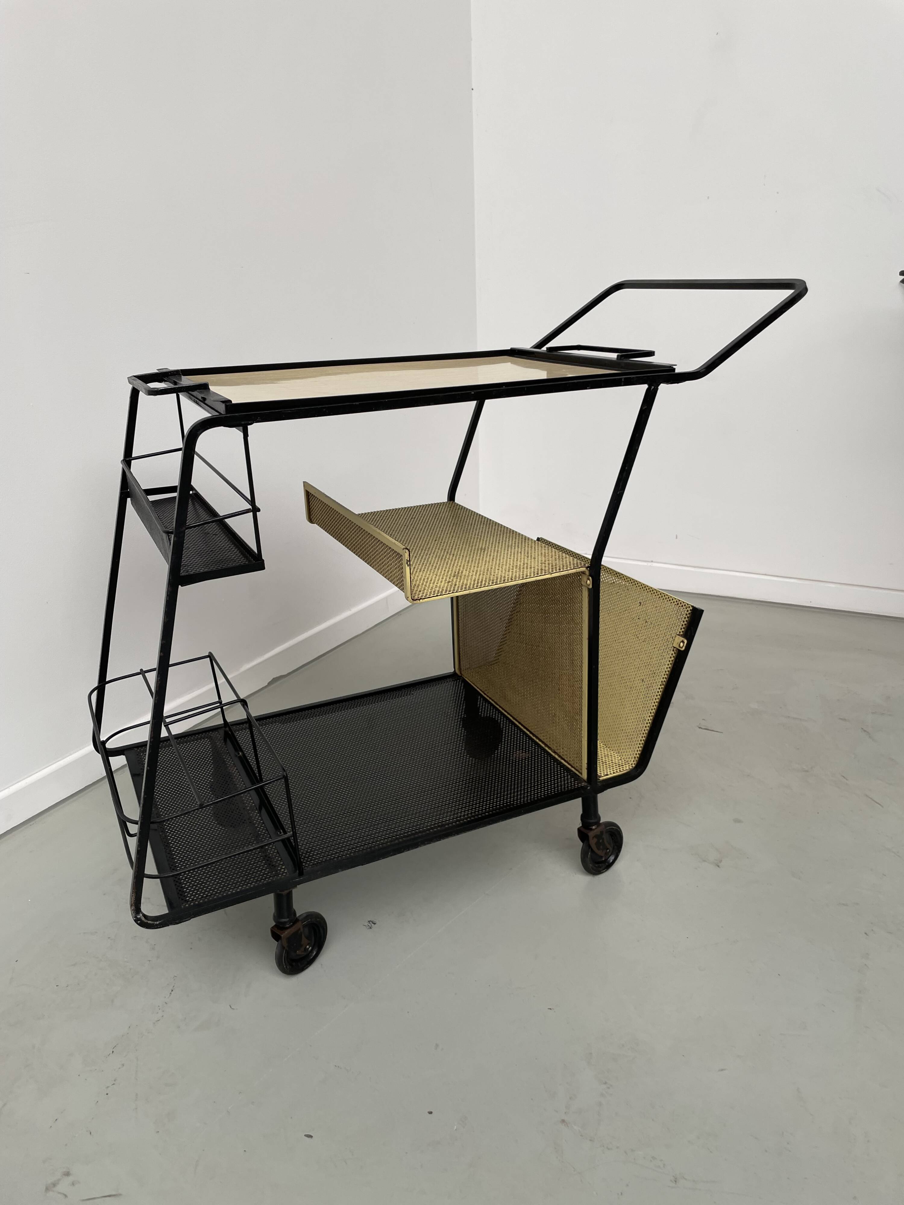 Perforated metal serving trolley in the Mathieu Matégot style