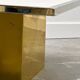 Brute travertine coffee table with brass base and chrome edges, France 1970s.
