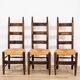 Set of 4 brutalist chairs in carved wood and straw – Circa 1940