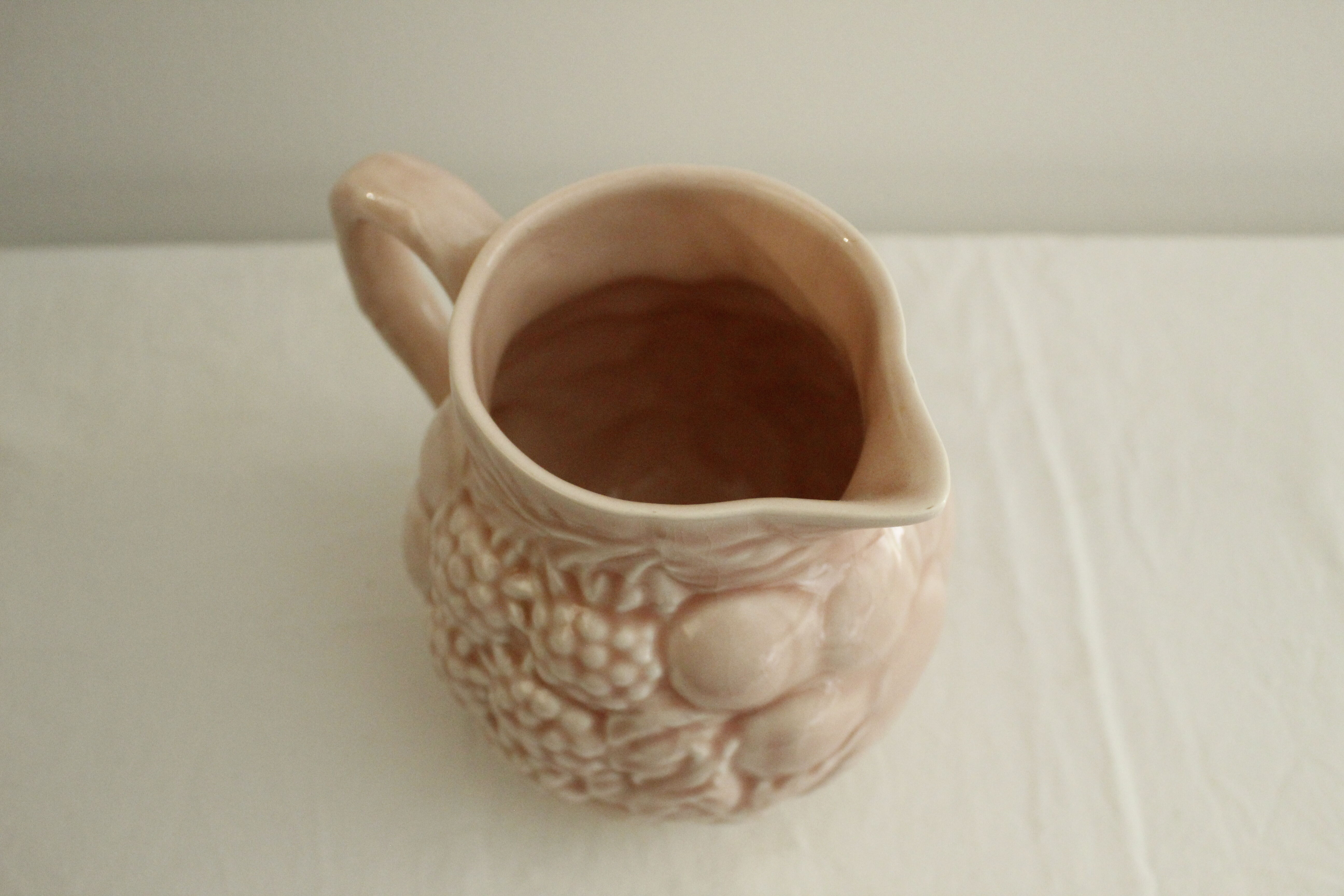 Pink pitcher - glazed ceramics - raspberry reliefs - Salins les Bains