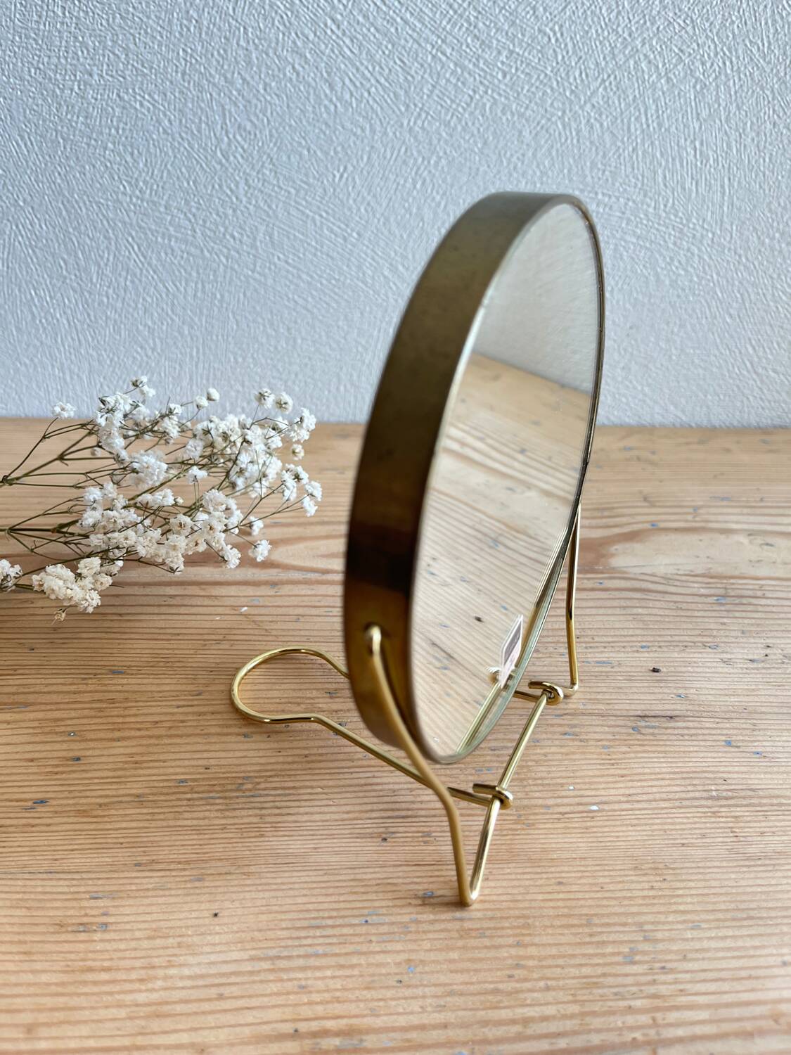 Vintage round gold barber mirror