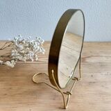Vintage round gold barber mirror
