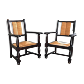 Paire de fauteuils Néo-basque 1950 vintage  en chêne, assises et dossiers paillés.