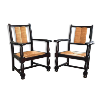 Pair of vintage 1950 Neo-Basque armchairs in oak, straw-covered seats and backs.