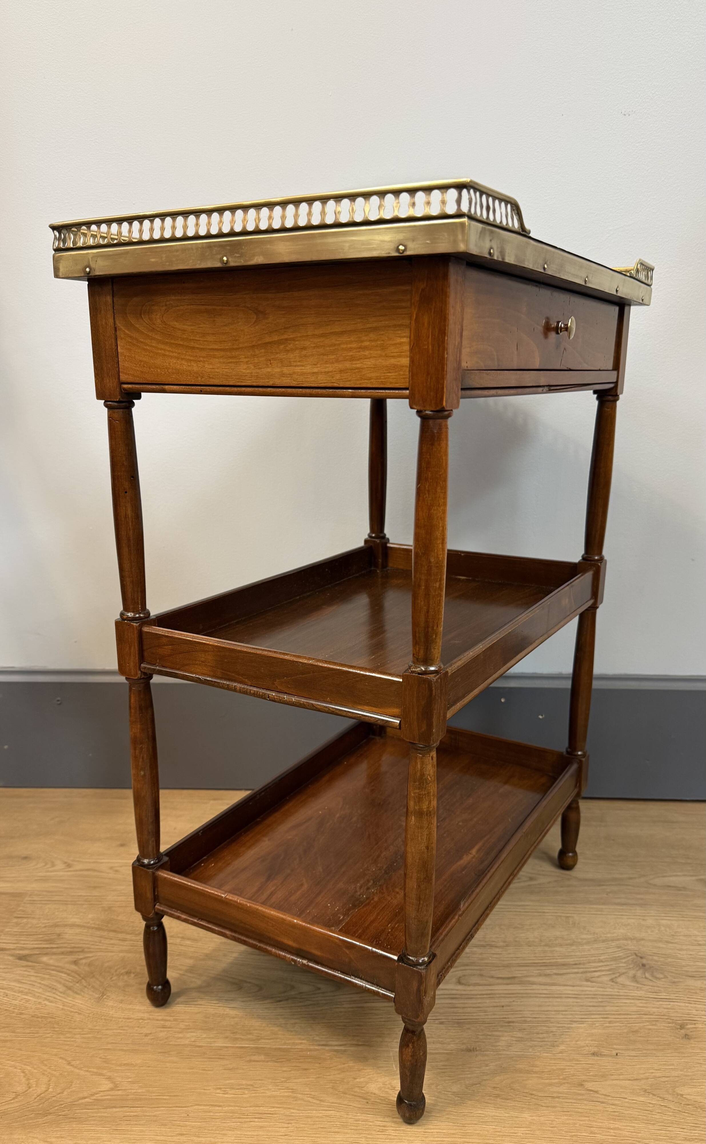 Small mahogany side table in Louis XVI style.