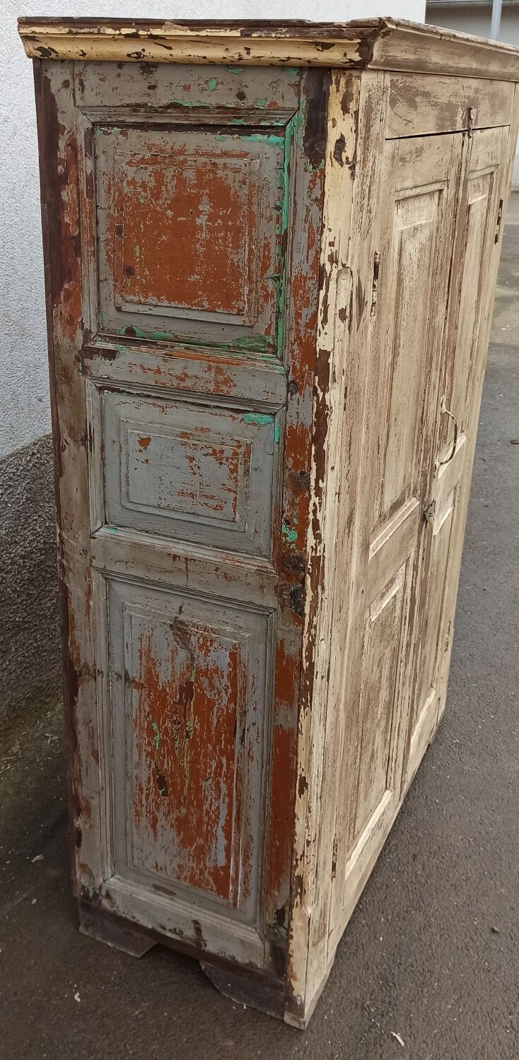 Old wooden wardrobe beige / pale yellow façade