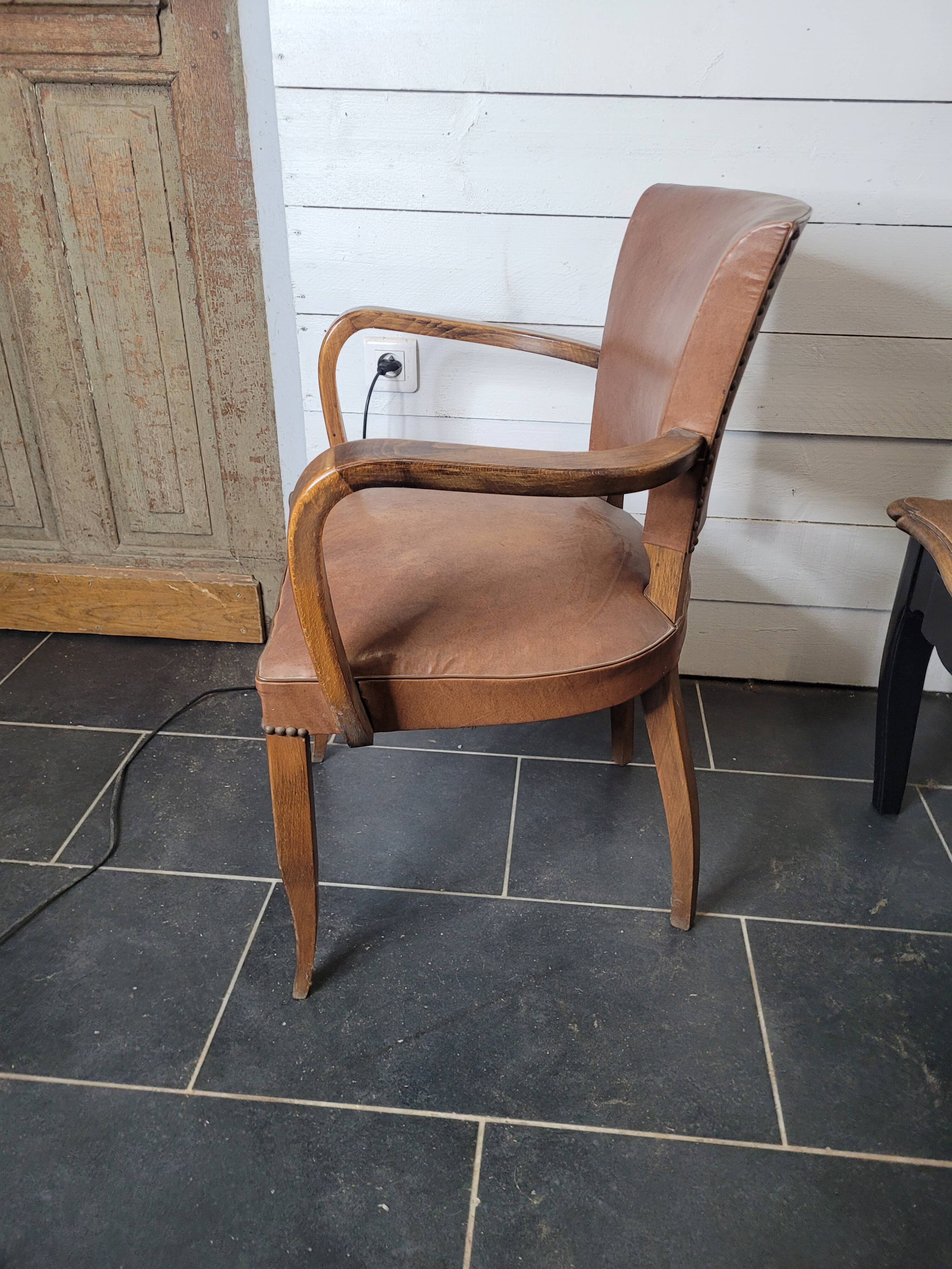 Bridge armchair in skai from the 60s