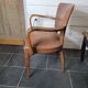 Bridge armchair in skai from the 60s