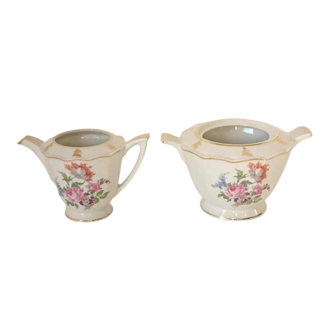 Sugar bowl and milk jar in flowery white porcelain