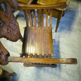 Pair of curule armchairs in solid teak circa 1980