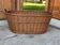 Rustic brown wicker basket from the 1940s — large oval laundry basket 68 x 45 cm