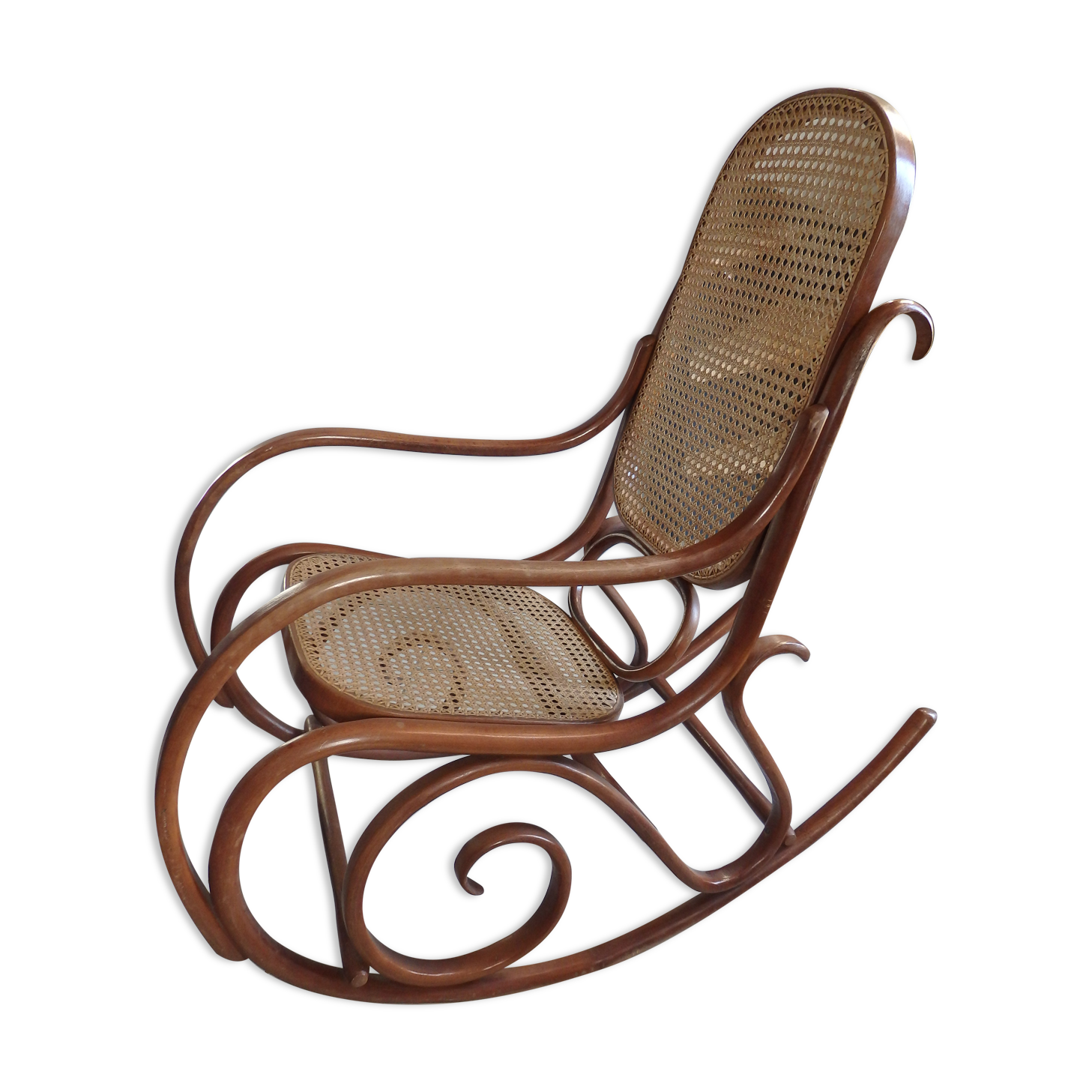 Rocking-chair in turned wood and cannage