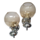 Pair of chrome metal wall lights with vintage sandblasted glass globes