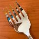 Christofle Aria gold ring serving fork