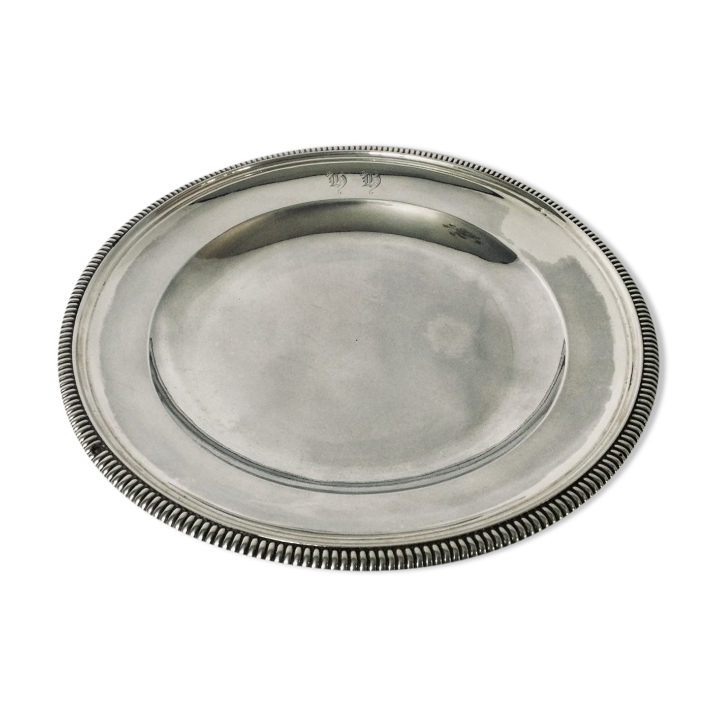 Solid silver dish with old man