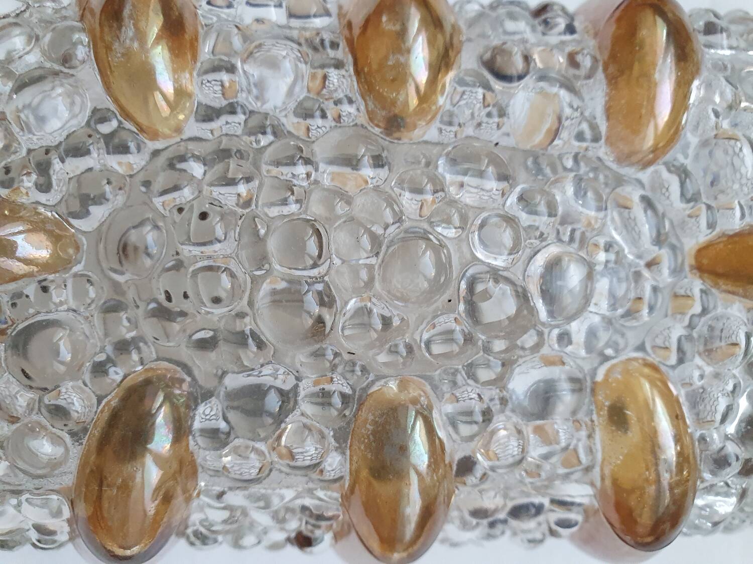 Bubble glass and amber wall light