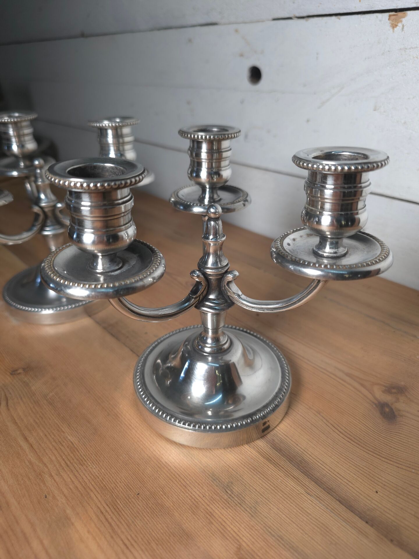 Pair of silver-plated candlesticks