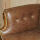 Chesterfield Regency 1810 antique canapé restored in leather with a carved frame.