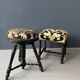 Small black round-cushionstool
