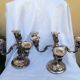 Pair of candlesticks in silver metal