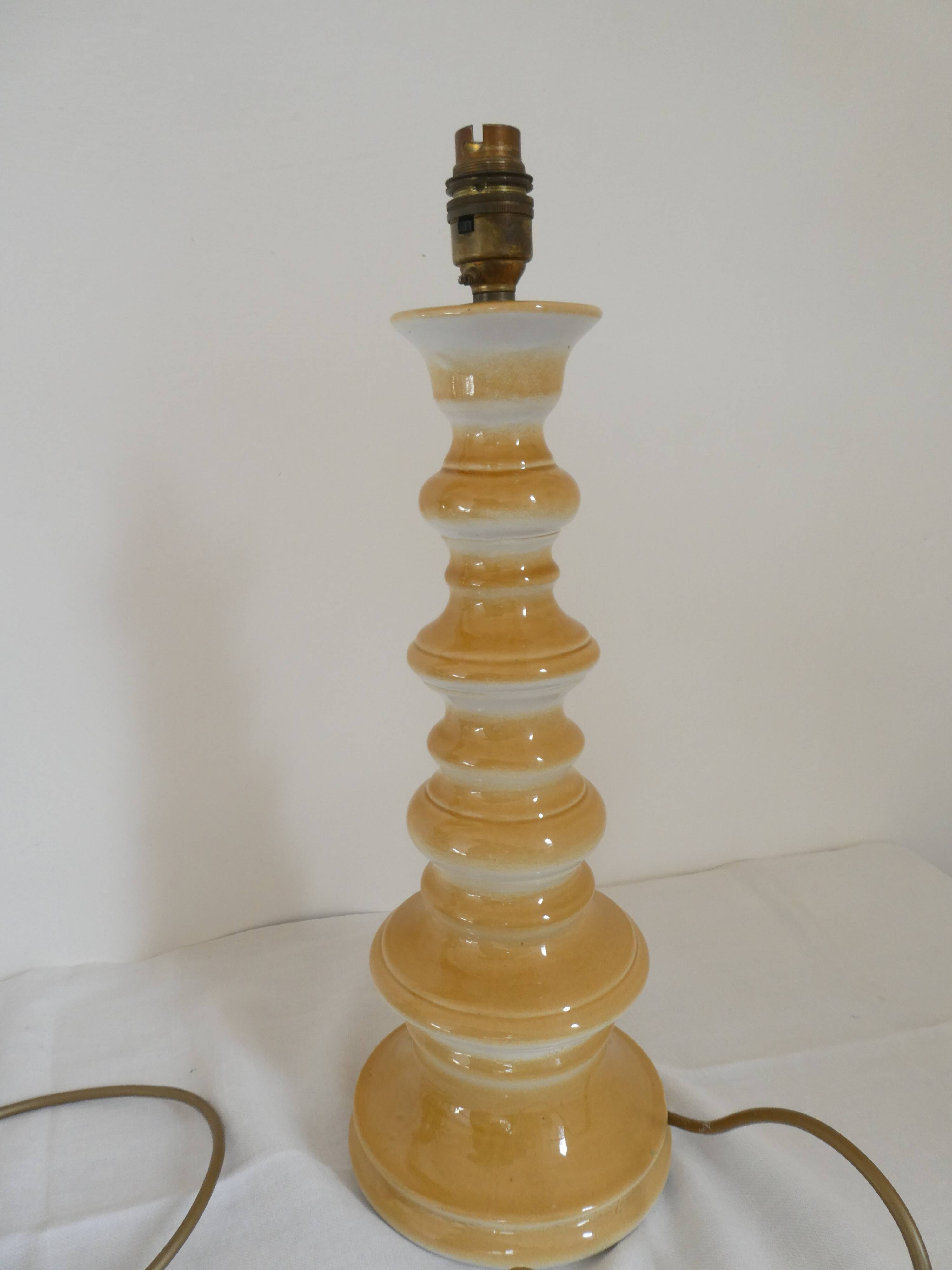 Large baluster-shaped lamp base in yellow and beige ceramic from the 1960s.