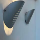 Pair of vintage adjustable wall lights, curved striated metal, France 1980