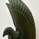 Pair of eagle bookends in green patina regula with rosewood base