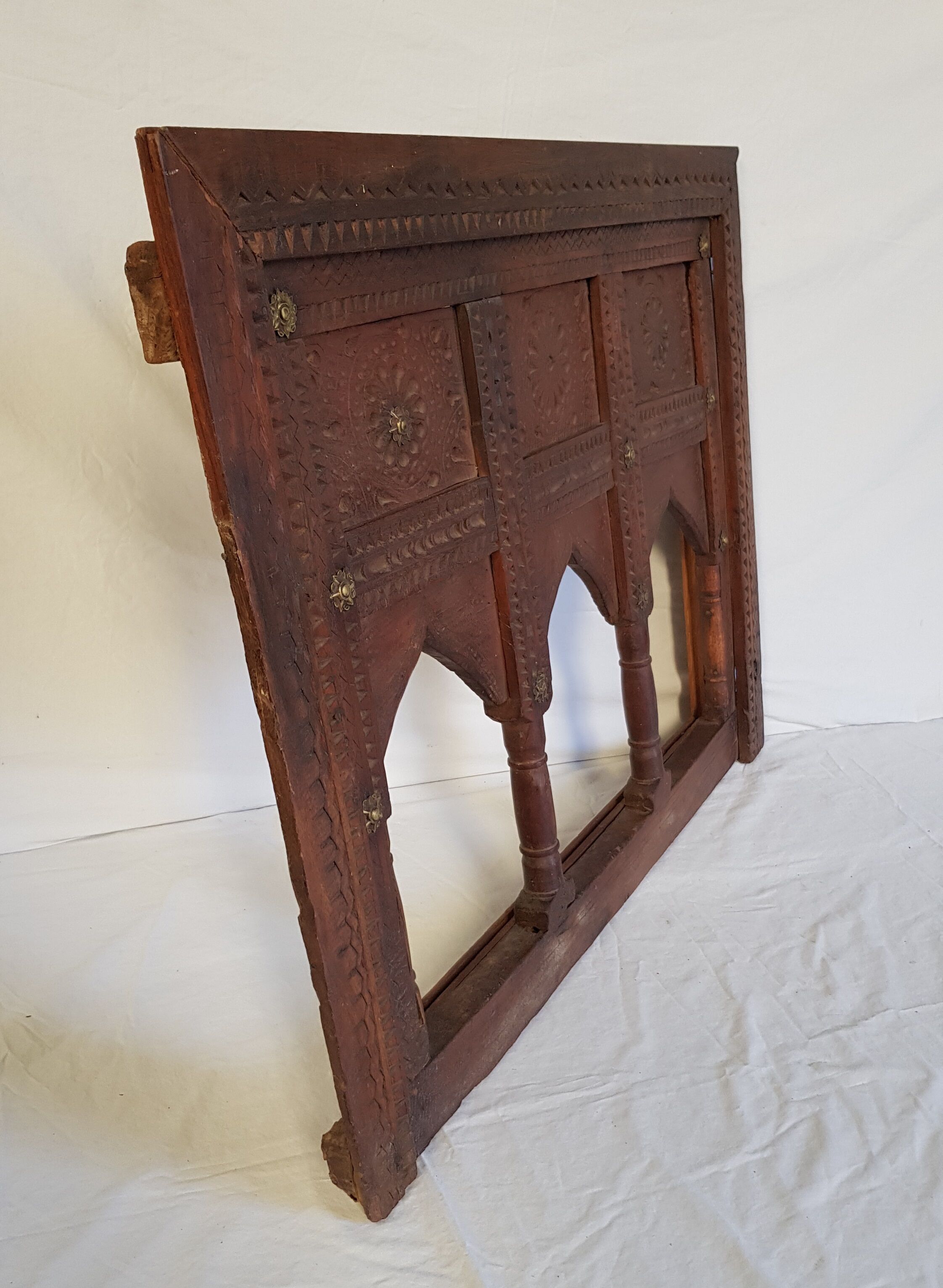 Carved wooden window with rear support for possible mirror