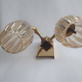 Golden bronze wall lamp with mermaids for an old bathroom.