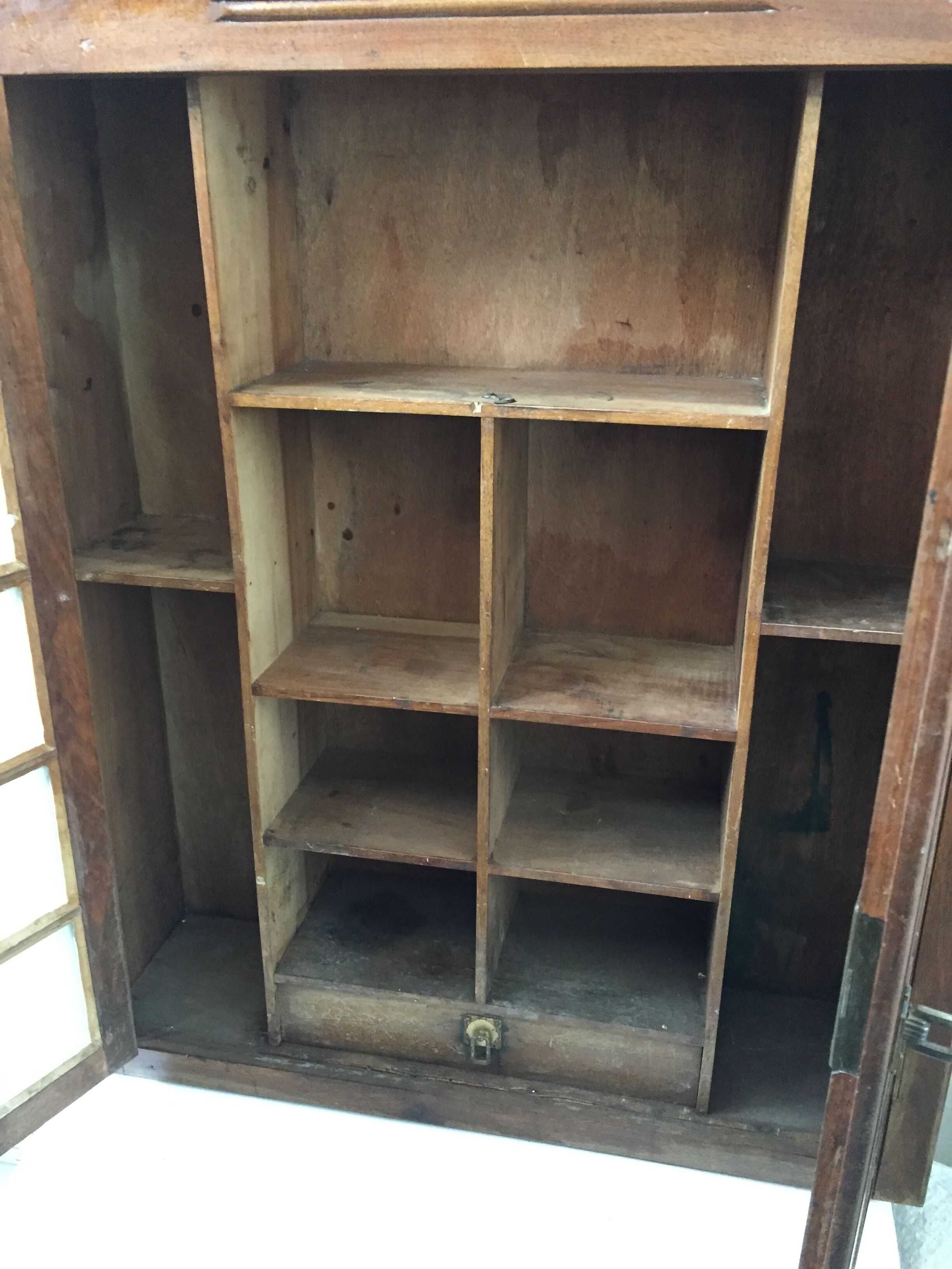 Old wall case has pharmacy