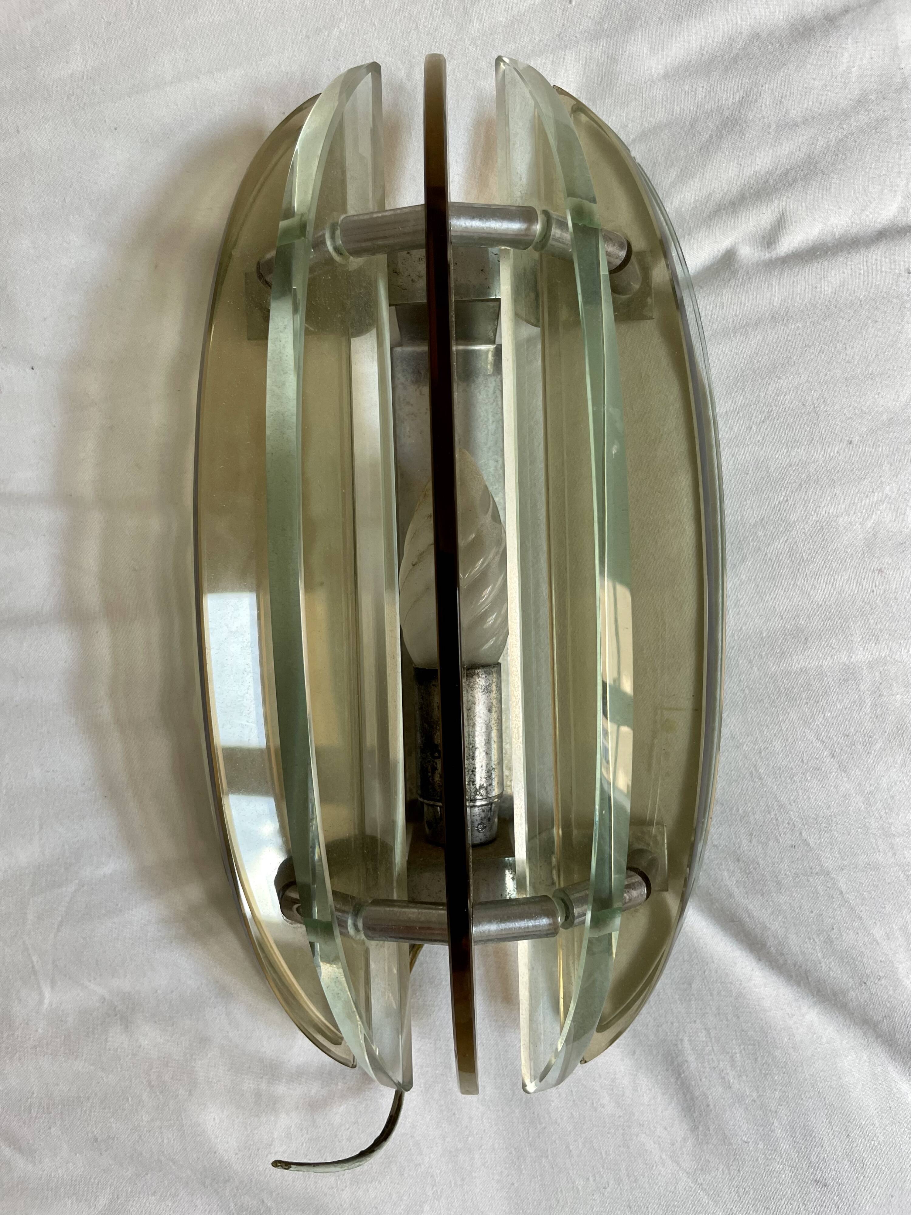 Pairs of VECA wall lights