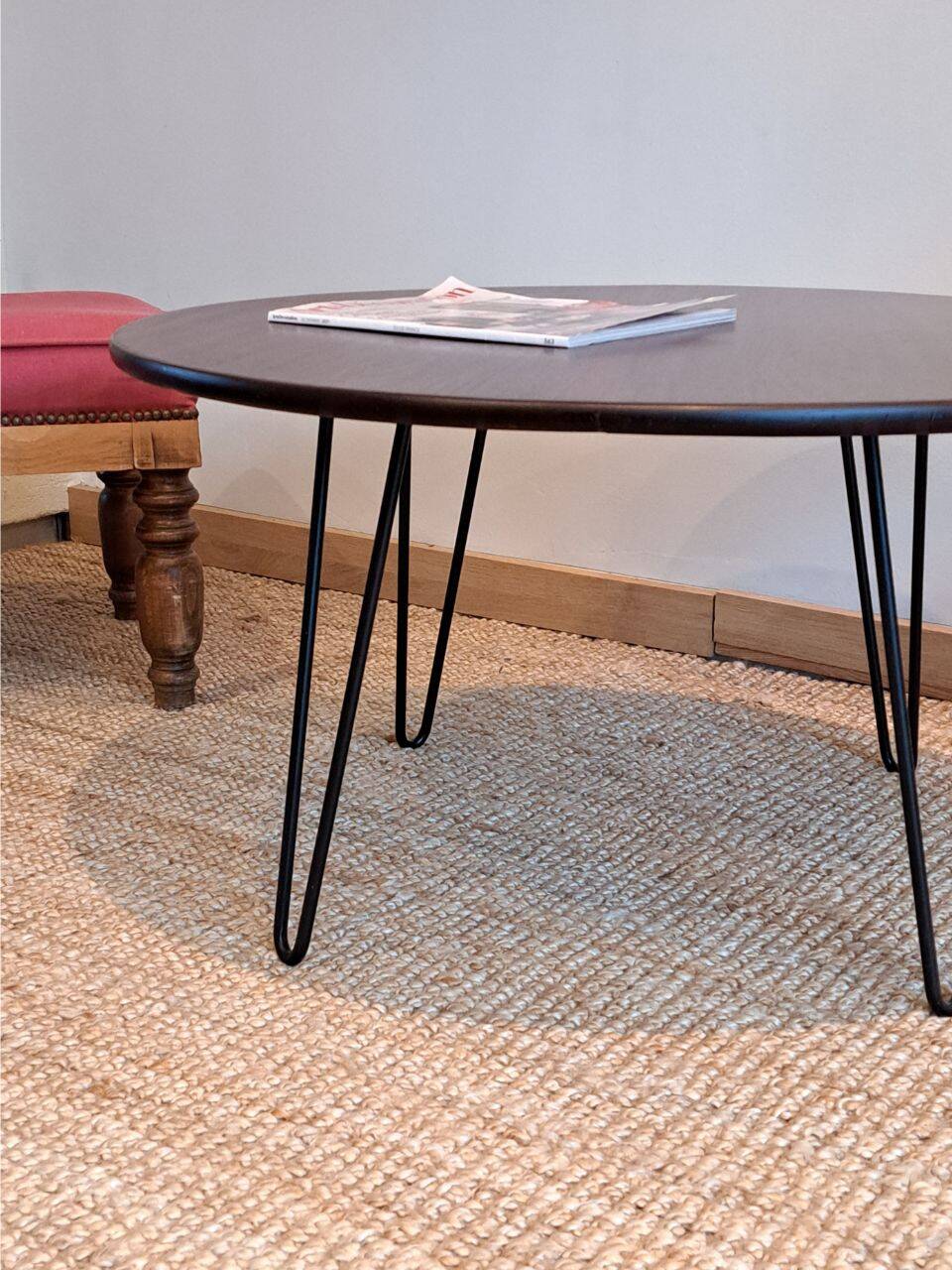Round coffee table with mahogany wood top