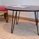 Round coffee table with mahogany wood top