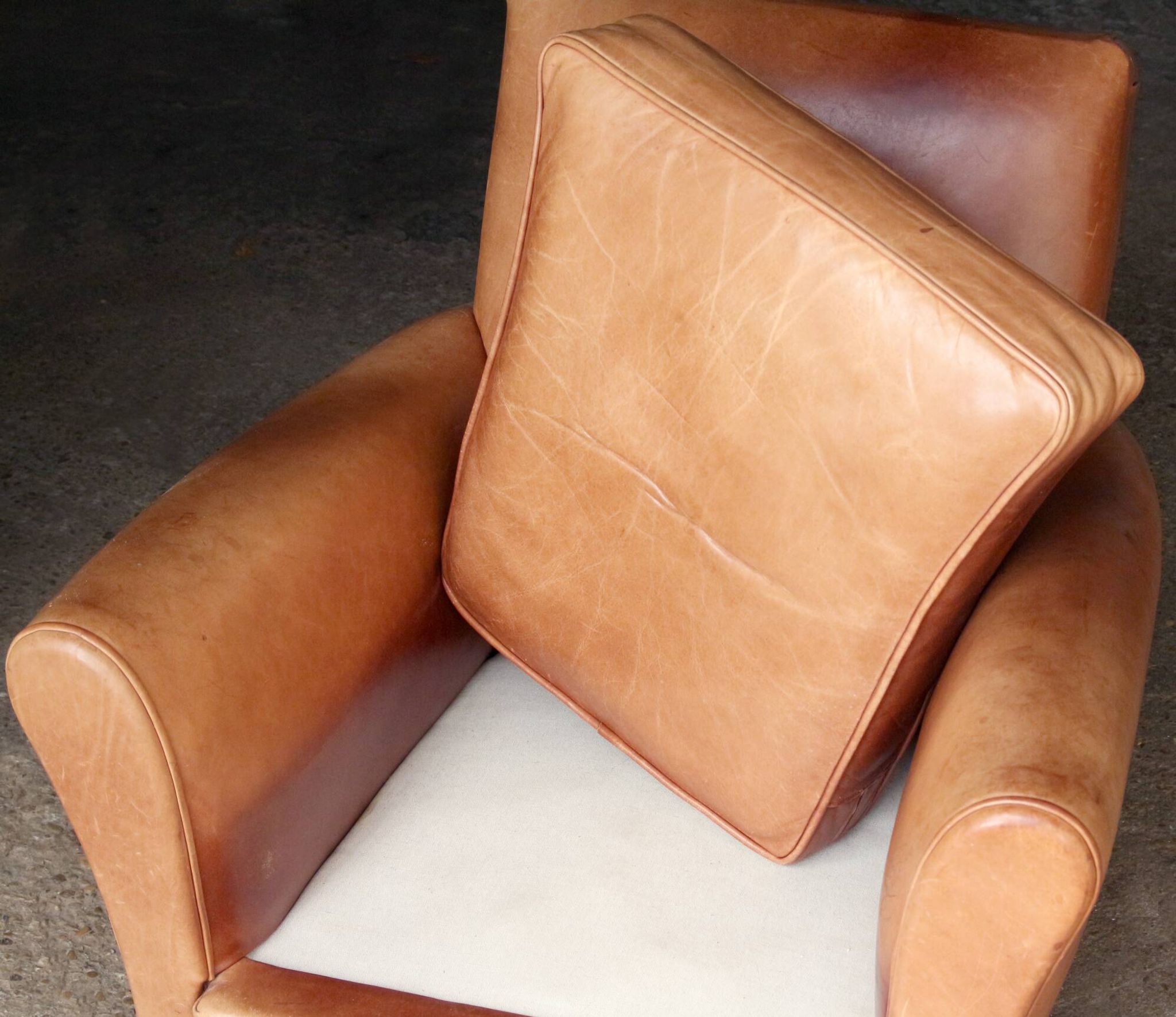 Fauteuil club en cuir vintage. très bel état.