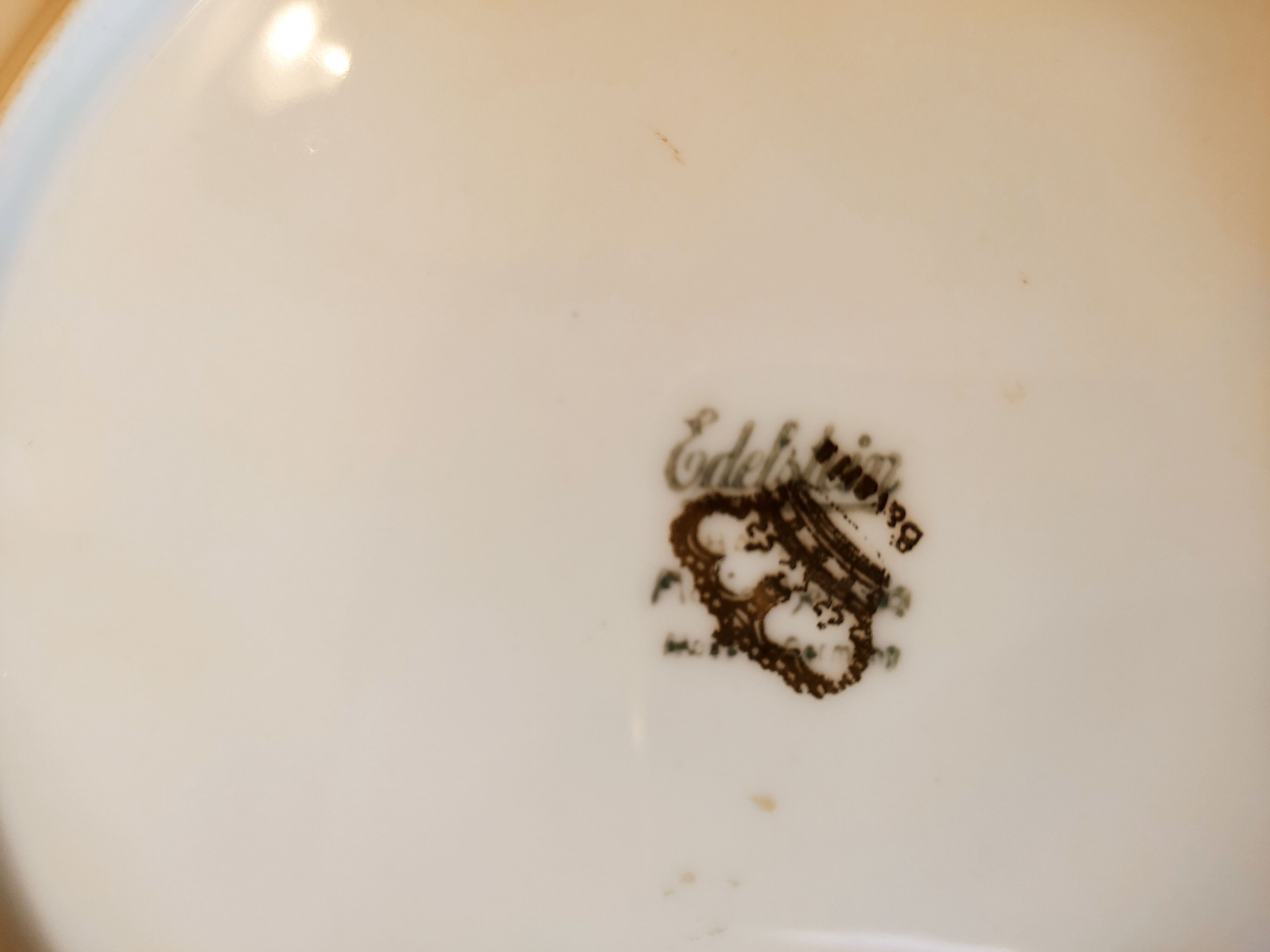 6 mismatched dessert plates decorated with roses