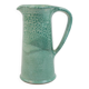 Large green ceramic pitcher with leopard enamel