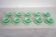 10 almond green opaline cups and saucers from the 50s